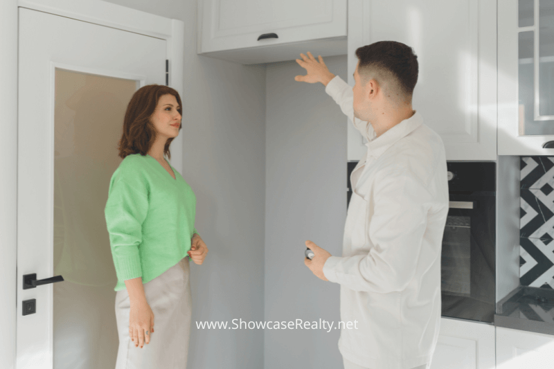 Downtown Charlotte NC real estate tour with a broker showing a buyer a modern urban property.
