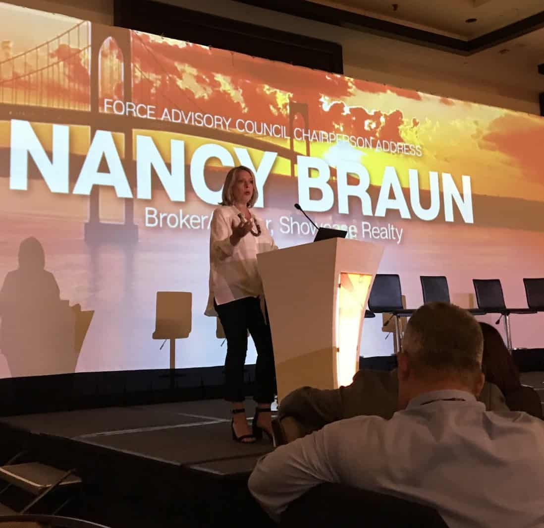 Nancy Braun addressing the FORCE Advisory Council from the stage